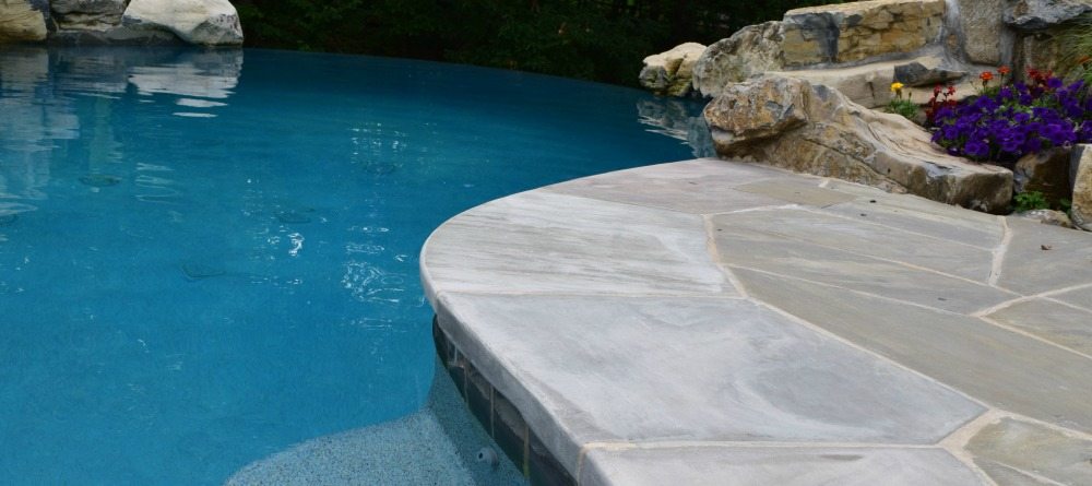 The Top Benefits of Using Porcelain Pavers Around Your Pool