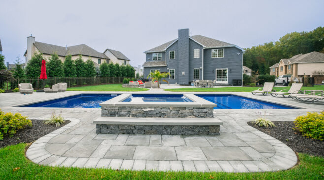 Pool coping around beautiful backyard built in pool