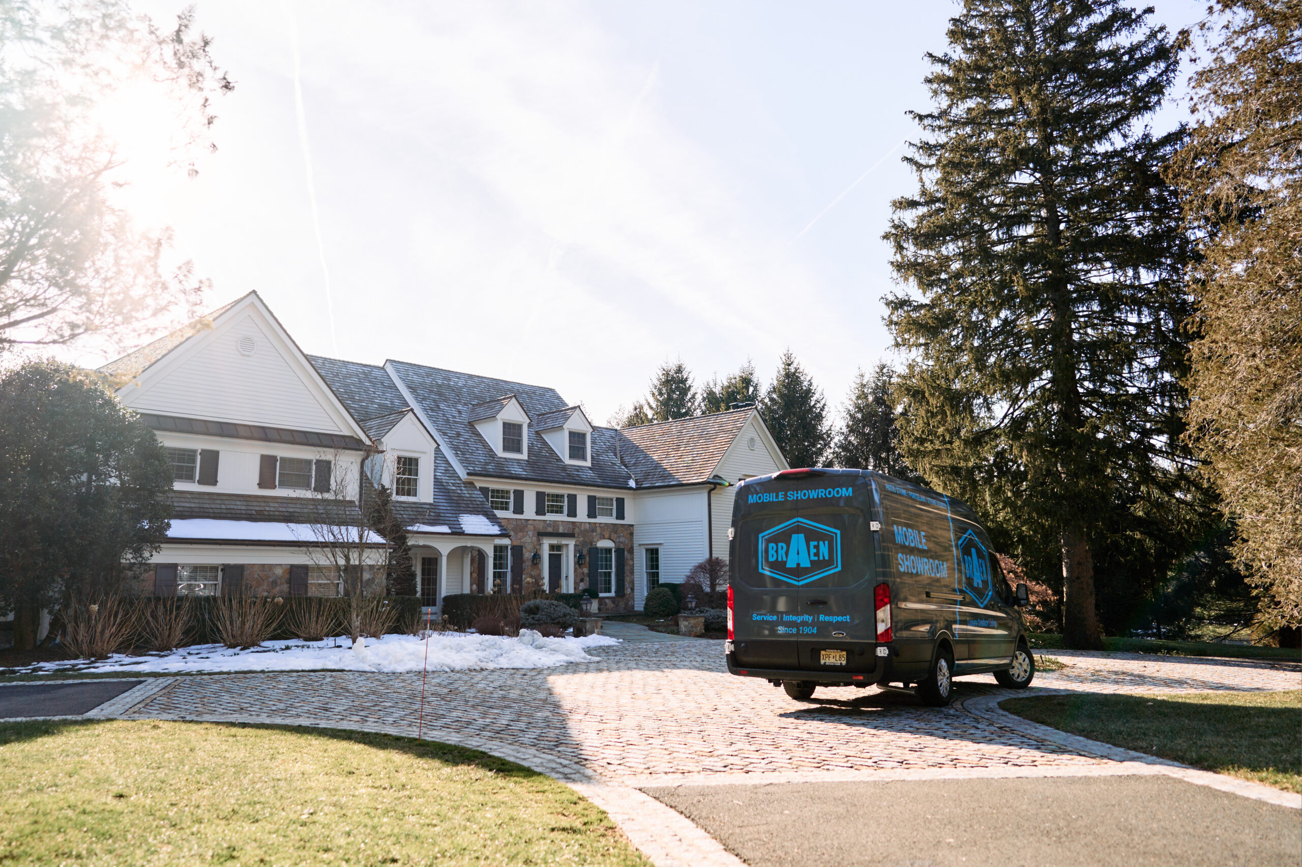 Mobile showroom parked in front of a customer's home