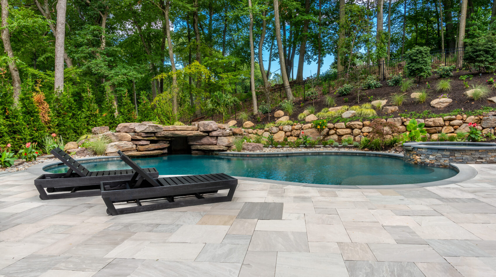 Mirage Porcelain Pavers are used for this poolside patio with pool coping