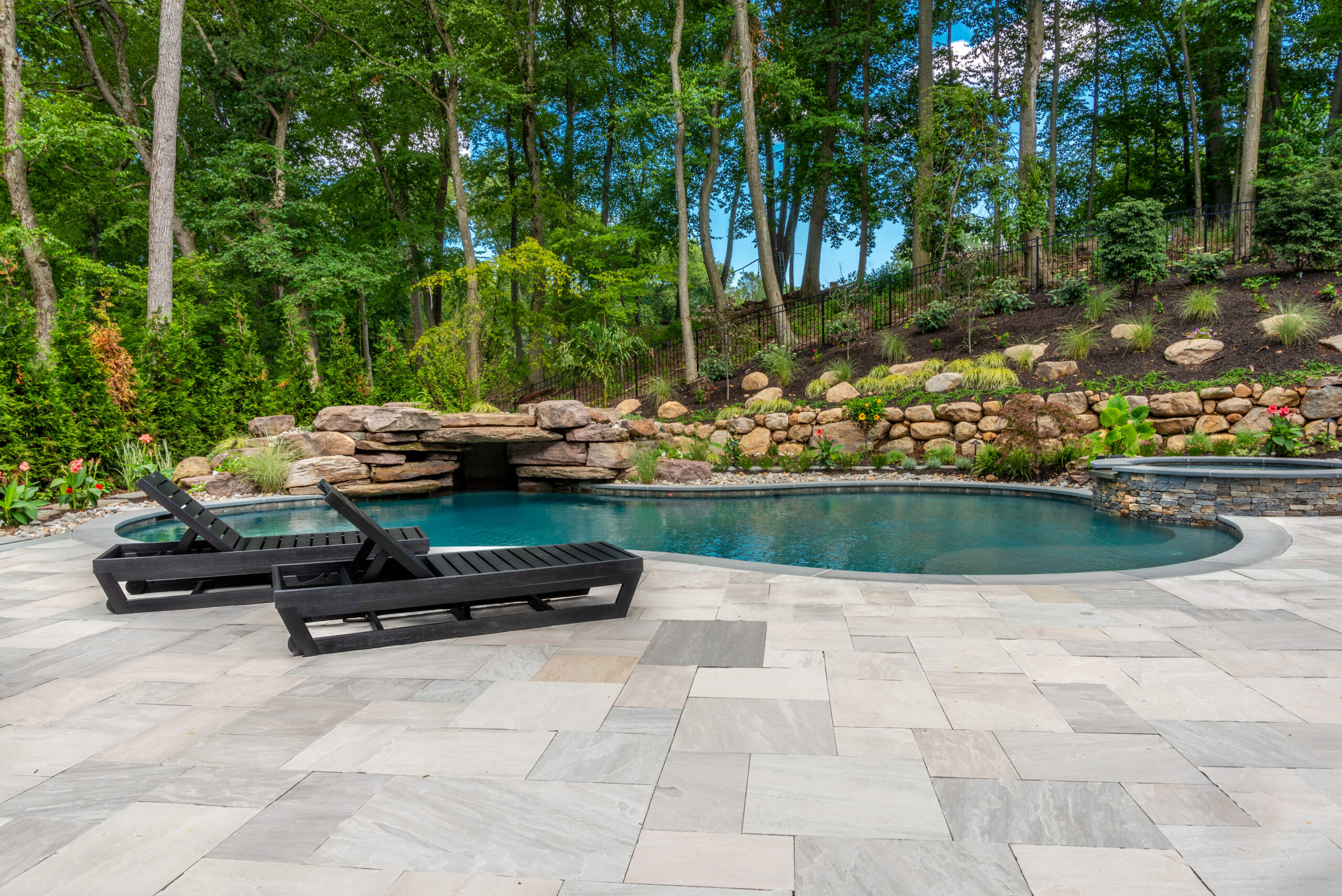 Mirage Porcelain Pavers are used for this poolside patio with pool coping