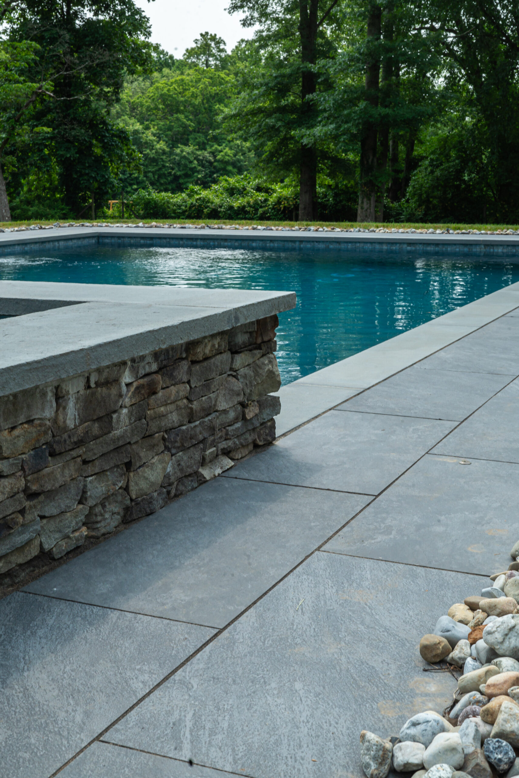 pool coping with porcelain patio