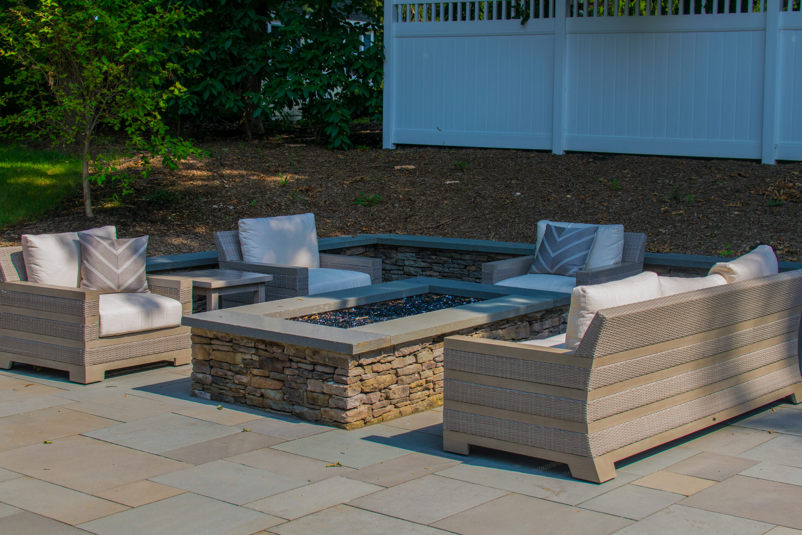 outdoor fire feature complemented by a beautiful patio