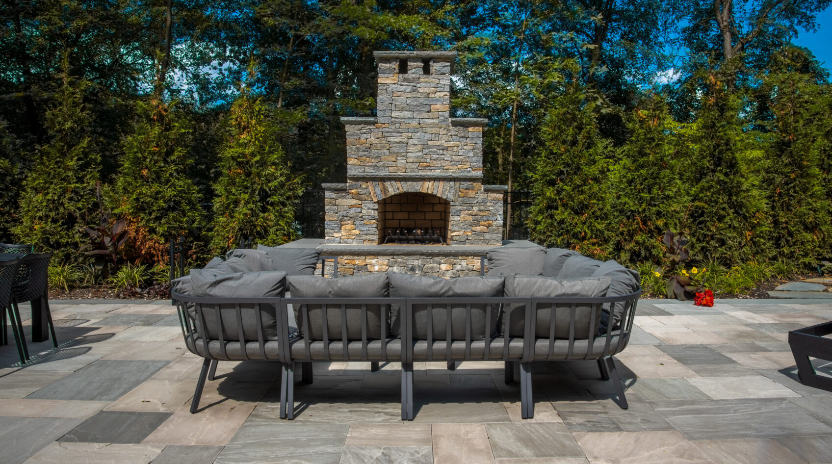 Outdoor fireplace with a beautiful stone facade
